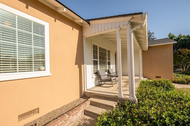 2837 N Thorne Ave, Fresno, CA 93704 - entrance to property with a porch and stucco siding