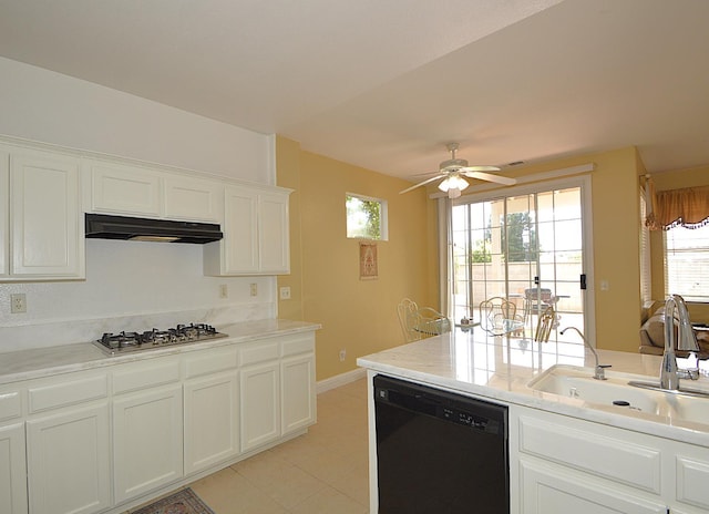 1756 N Holly Ave, Clovis, CA 93619 - kitchen with black dishwasher, stainless steel gas cooktop, a sink, under cabinet range hood, and a ceiling fan
