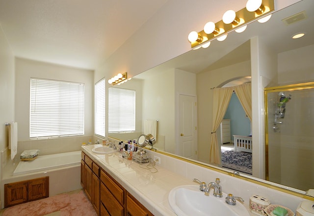 1756 N Holly Ave, Clovis, CA 93619 - ensuite bathroom featuring double vanity, a shower stall, and a bath