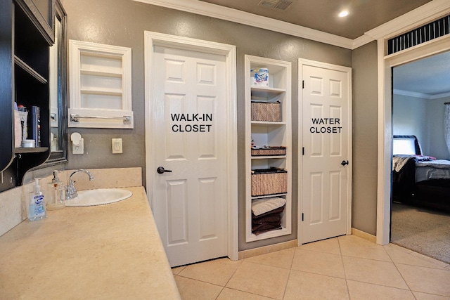 3356 N Burgan Ave, Fresno, CA 93727 - interior space with ornamental molding and light tile patterned floors