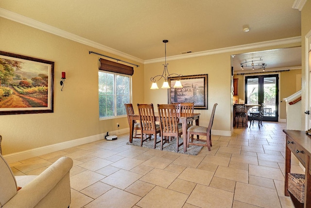 3356 N Burgan Ave, Fresno, CA 93727 - dining area with plenty of natural light, ornamental molding, and a chandelier