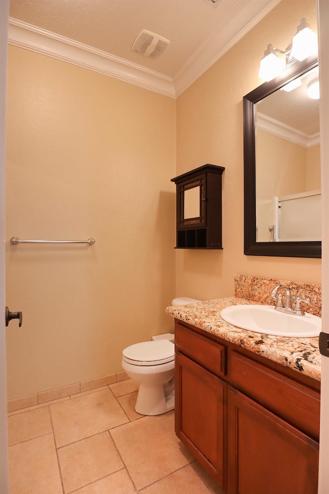 3356 N Burgan Ave, Fresno, CA 93727 - bathroom featuring vanity, ornamental molding, and tile patterned floors
