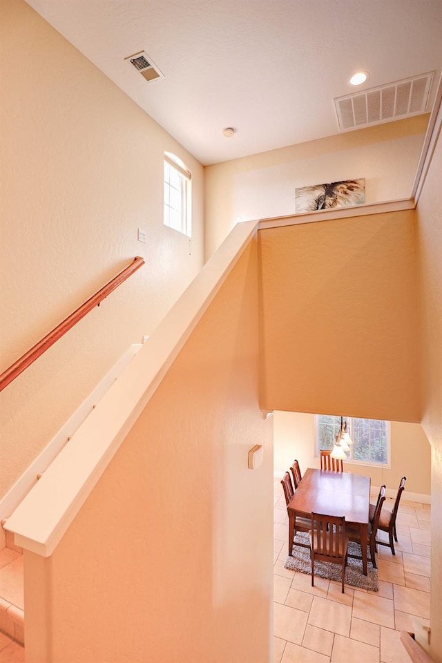 3356 N Burgan Ave, Fresno, CA 93727 - stairway with tile patterned flooring and recessed lighting