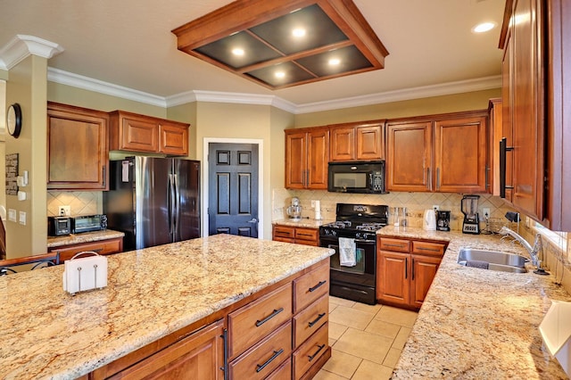 3356 N Burgan Ave, Fresno, CA 93727 - kitchen featuring black appliances, backsplash, light stone counters, crown molding, and brown cabinetry