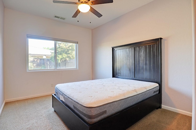 3356 N Burgan Ave, Fresno, CA 93727 - carpeted bedroom with baseboards and a ceiling fan