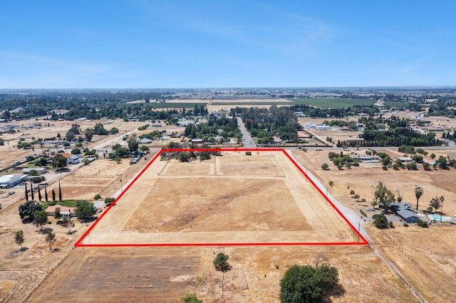 8574 E Herndon Ave, Clovis, CA 93619 - aerial view of sparsely populated area featuring property parcel outlined