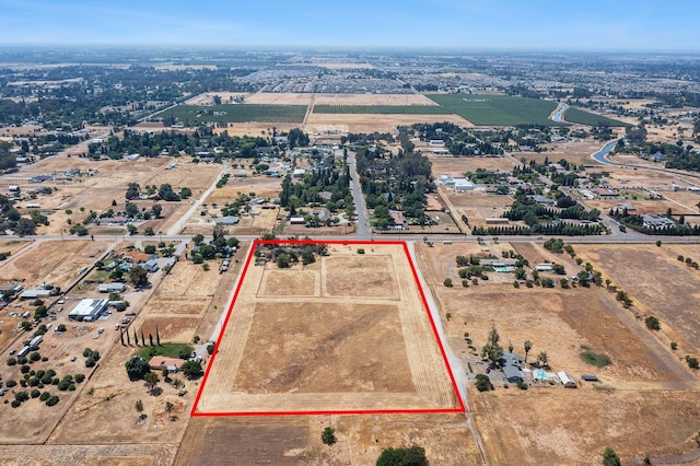 8574 E Herndon Ave, Clovis, CA 93619 - aerial overview of property's location featuring property parcel outlined