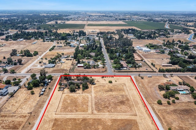 8574 E Herndon Ave, Clovis, CA 93619 - aerial view of property and surrounding area with property parcel outlined