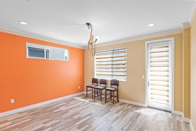 977 24th St, Oakland, CA 94607 - dining space with crown molding, wood finished floors, baseboards, and recessed lighting