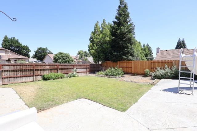 1976 Decatur Ave, Clovis, CA 93611 - view of yard featuring a patio