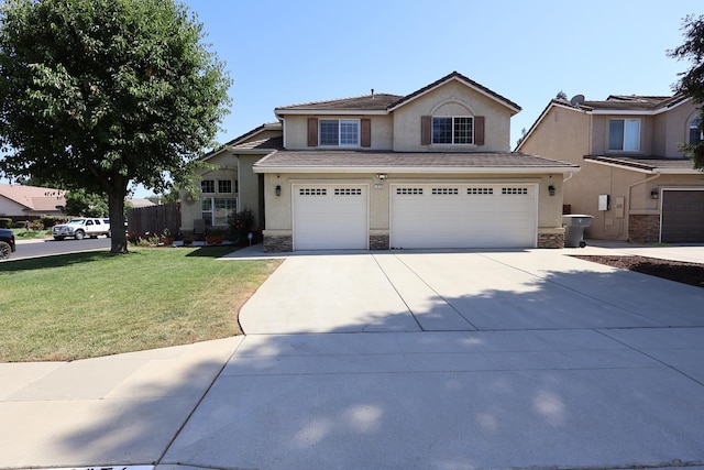 1976 Decatur Ave, Clovis, CA 93611 - traditional-style home featuring stucco siding, stone siding, a garage, and concrete driveway