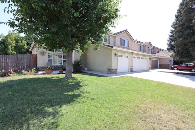 1976 Decatur Ave, Clovis, CA 93611 - view of front of house with stucco siding, concrete driveway, stone siding, and a garage