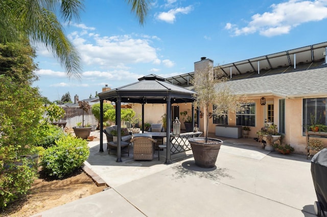 5860 W Menlo Ave, Fresno, CA 93722 - view of patio / terrace with a gazebo and an outdoor living space