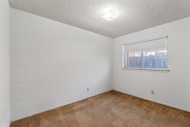 4782 W Austin Way, Fresno, CA 93722 - unfurnished room with carpet floors and a textured ceiling