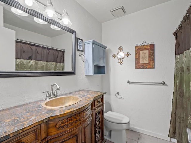 7352 N Adoline Ave, Fresno, CA 93711 - full bathroom featuring vanity, tile patterned floors, toilet, and a shower with curtain