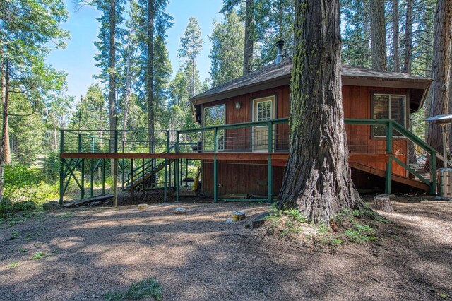 42272 Hanging Branch Rd, Shaver Lake, CA 93664 - view of front of house with stairs and a deck
