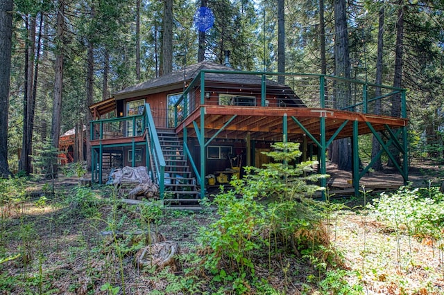 42272 Hanging Branch Rd, Shaver Lake, CA 93664 - rear view of property featuring stairway, a deck, and a forest view