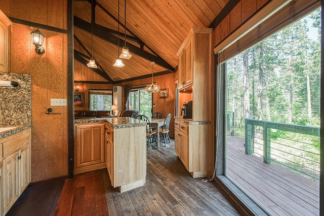 42272 Hanging Branch Rd, Shaver Lake, CA 93664 - kitchen with dark wood-style flooring, wooden walls, wood ceiling, a center island, and hanging light fixtures