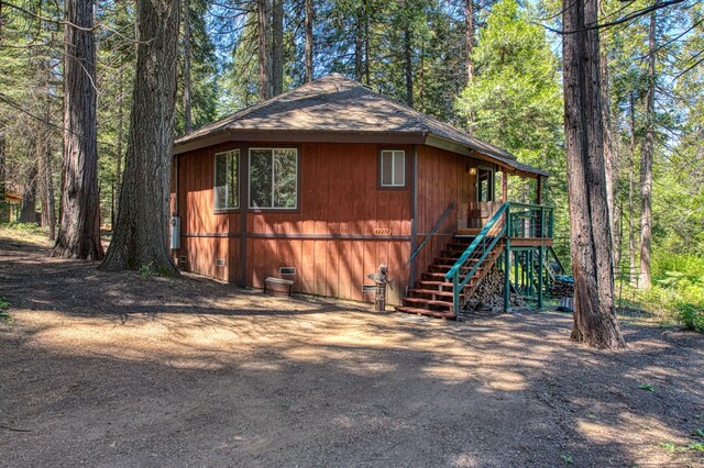 42272 Hanging Branch Rd, Shaver Lake, CA 93664 - view of home's exterior with crawl space, stairway, and a shingled roof