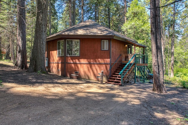 42272 Hanging Branch Rd, Shaver Lake, CA 93664 - view of side of home featuring crawl space, stairway, and a shingled roof