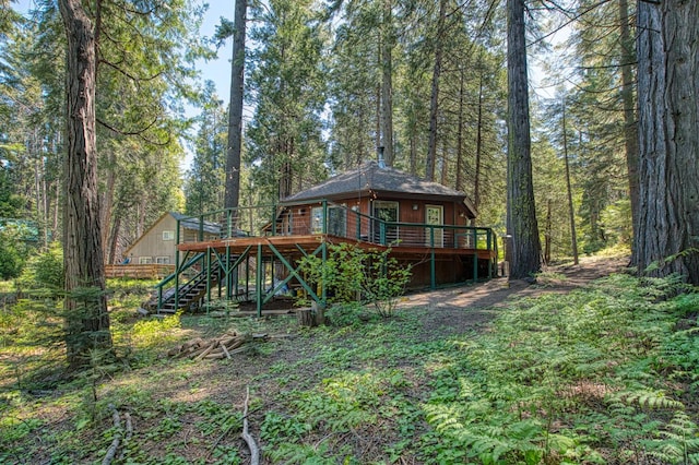 42272 Hanging Branch Rd, Shaver Lake, CA 93664 - back of property featuring stairs, a wooden deck, and a wooded view