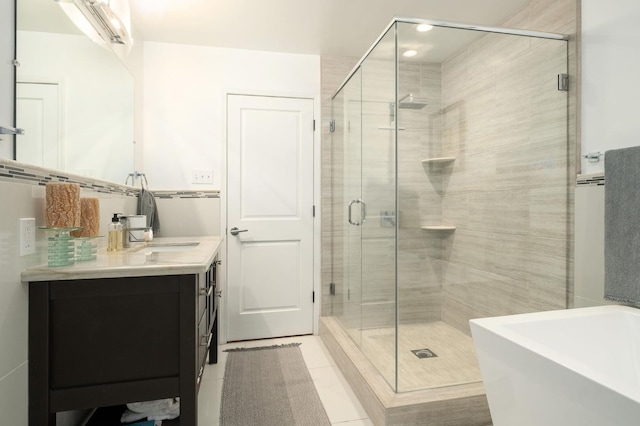 5309 N Parrish Way, Fresno, CA 93711 - bathroom with vanity, a freestanding bath, a shower stall, and tile patterned flooring