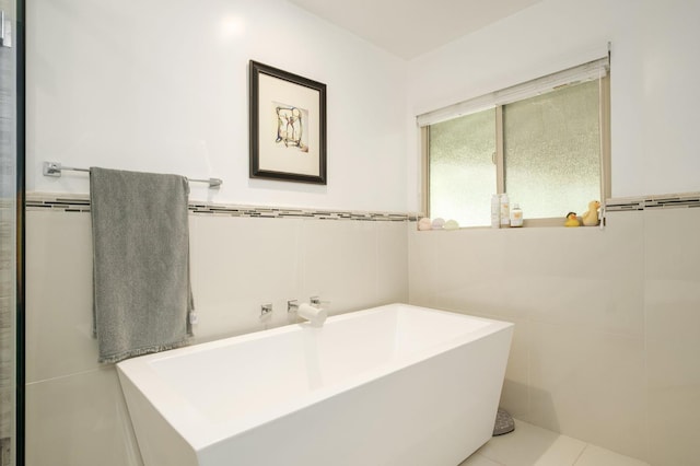 5309 N Parrish Way, Fresno, CA 93711 - bathroom featuring tile walls and wainscoting