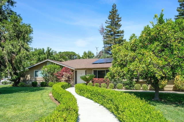 5309 N Parrish Way, Fresno, CA 93711 - view of front of property featuring solar panels and a front yard