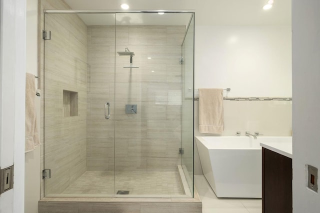 5309 N Parrish Way, Fresno, CA 93711 - full bath with a freestanding bath, vanity, and a stall shower