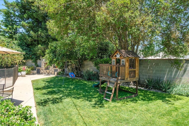 5309 N Parrish Way, Fresno, CA 93711 - view of yard featuring a playground and a patio