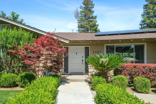 5309 N Parrish Way, Fresno, CA 93711 - property entrance with roof mounted solar panels