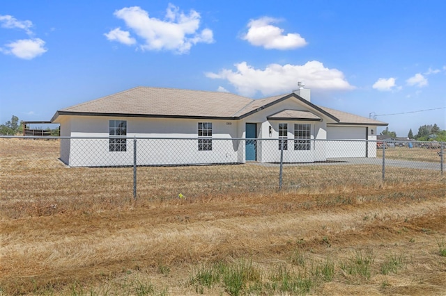 20434 Olympia Rd, Madera, CA 93638 - single story home featuring a garage, concrete driveway, and a chimney
