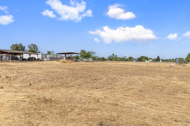20434 Olympia Rd, Madera, CA 93638 - view of yard featuring a carport