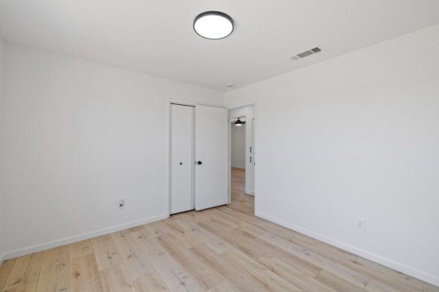 20434 Olympia Rd, Madera, CA 93638 - spare room with wood finished floors and baseboards