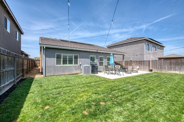 574 Expedition Way, Madera, CA 93636 - rear view of property with cooling unit, a patio, and stucco siding