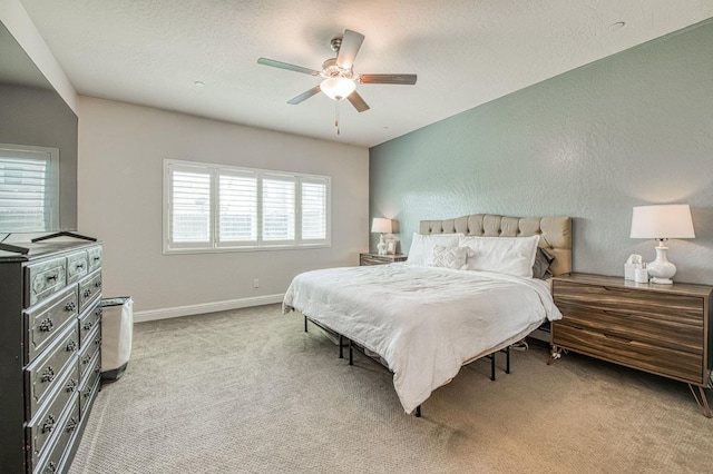 574 Expedition Way, Madera, CA 93636 - bedroom with light colored carpet, baseboards, and a ceiling fan