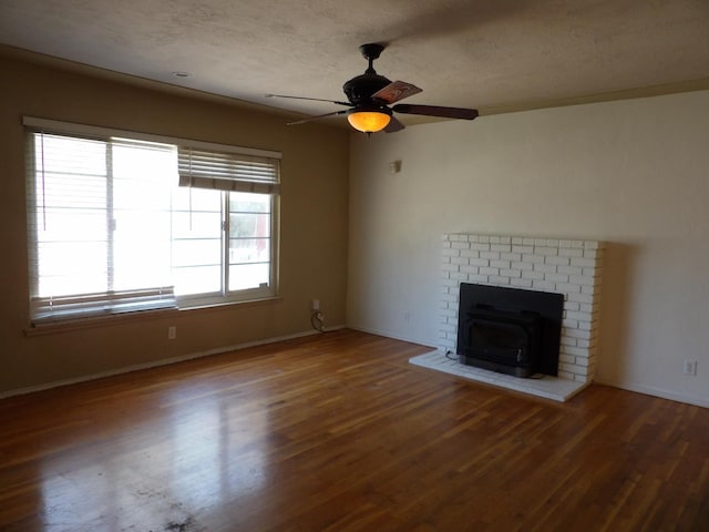 4321 Buckingham Way, Fresno, CA 93726 - unfurnished living room featuring wood finished floors, a ceiling fan, and a textured ceiling