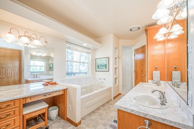 42010 Granite Ledge Ln, Shaver Lake, CA 93664 - full bath featuring a garden tub, double vanity, and a chandelier