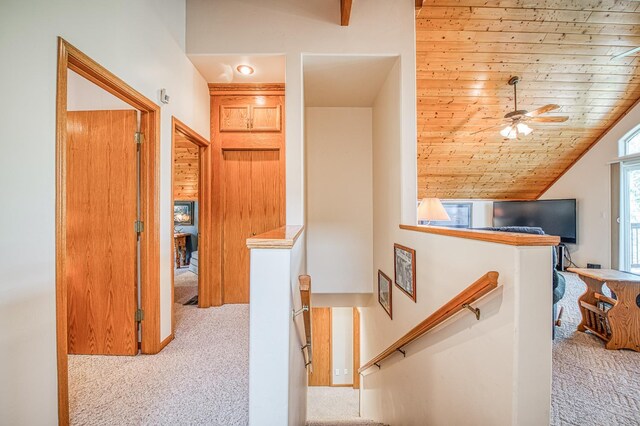 42010 Granite Ledge Ln, Shaver Lake, CA 93664 - corridor featuring carpet, an upstairs landing, lofted ceiling, and wood ceiling