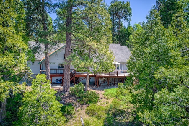 42010 Granite Ledge Ln, Shaver Lake, CA 93664 - rear view of property with a wooden deck and stairway