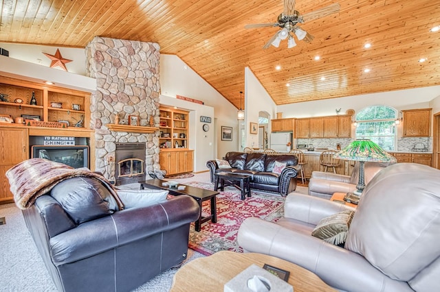 42010 Granite Ledge Ln, Shaver Lake, CA 93664 - carpeted living room with wooden ceiling, a ceiling fan, a stone fireplace, high vaulted ceiling, and recessed lighting