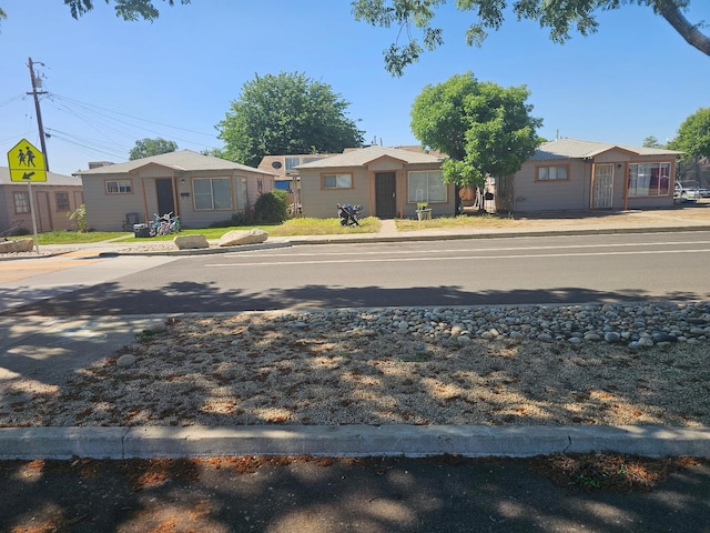393 Cherry, Coalinga, CA 93210 - view of asphalt road with curbs and sidewalks