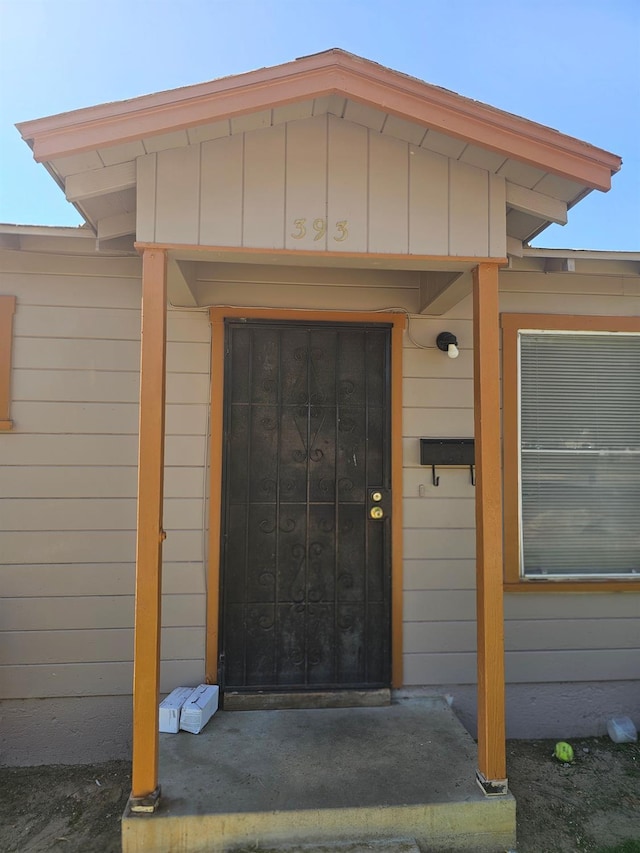 393 Cherry, Coalinga, CA 93210 - property entrance with board and batten siding