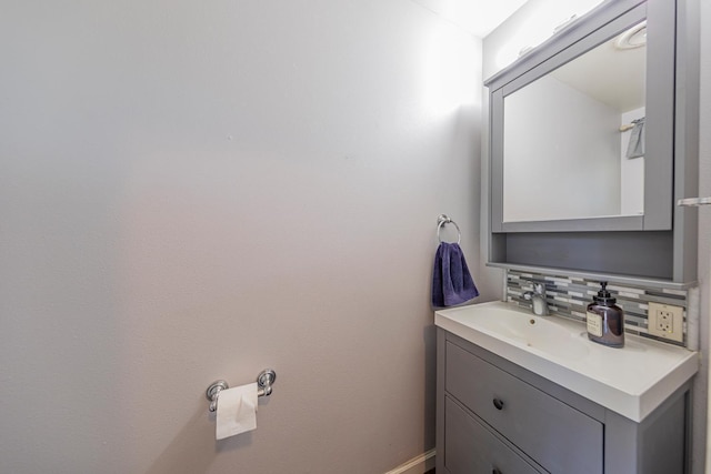 1096 Twain Ave W, Fresno, CA 93711 - bathroom featuring tasteful backsplash, vanity, and baseboards