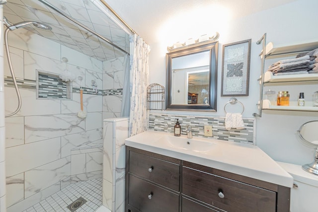 1096 Twain Ave W, Fresno, CA 93711 - bathroom with a shower stall, vanity, decorative backsplash, and toilet