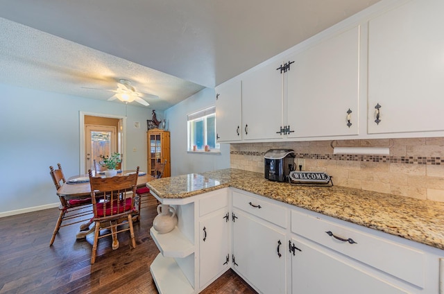 1096 Twain Ave W, Fresno, CA 93711 - kitchen with decorative backsplash, dark wood-style flooring, and white cabinets