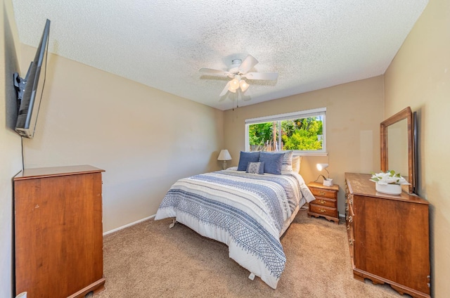 1096 Twain Ave W, Fresno, CA 93711 - bedroom with light colored carpet, a textured ceiling, ceiling fan, and baseboards