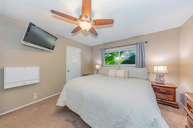 1096 Twain Ave W, Fresno, CA 93711 - bedroom featuring light colored carpet, baseboards, and a ceiling fan