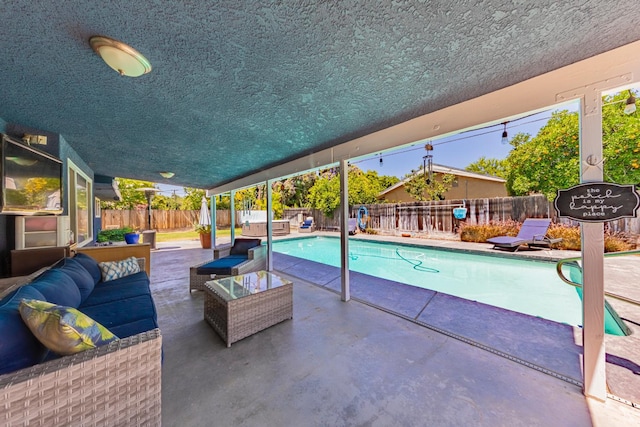 1096 Twain Ave W, Fresno, CA 93711 - view of swimming pool featuring a patio area, a fenced backyard, and an outdoor living space
