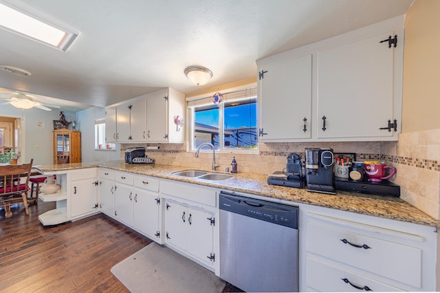 1096 Twain Ave W, Fresno, CA 93711 - kitchen with stainless steel dishwasher, a sink, a peninsula, white cabinets, and dark wood-style floors
